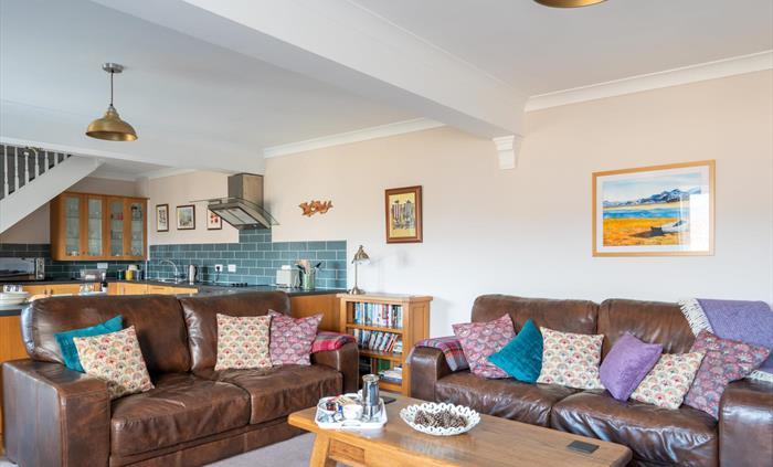 Large leather sofas in comfortable lounge of five star North Wales holiday cottage